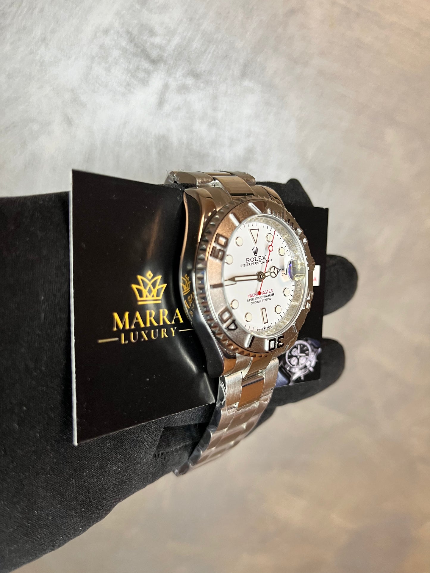 ROLEX YACHTMASTER QUADRANTE BIANCO CON DETTAGLI IN ROSSO