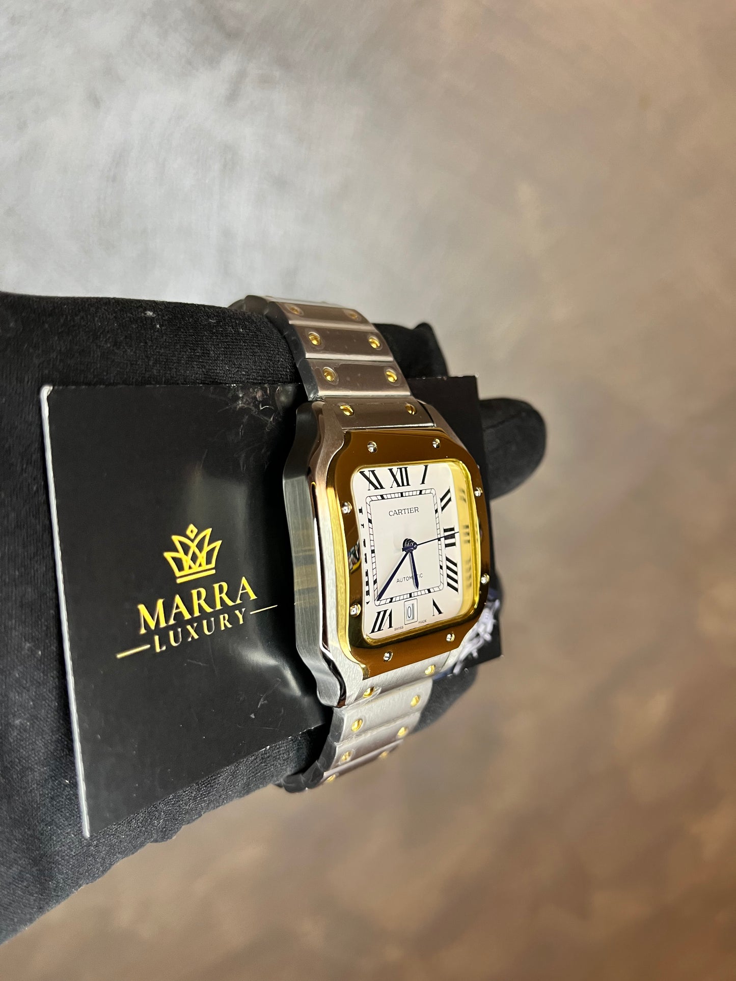CARTIER SANTOS 40 MM DATA ACCIAIO CON GHIERA ORO GIALLO