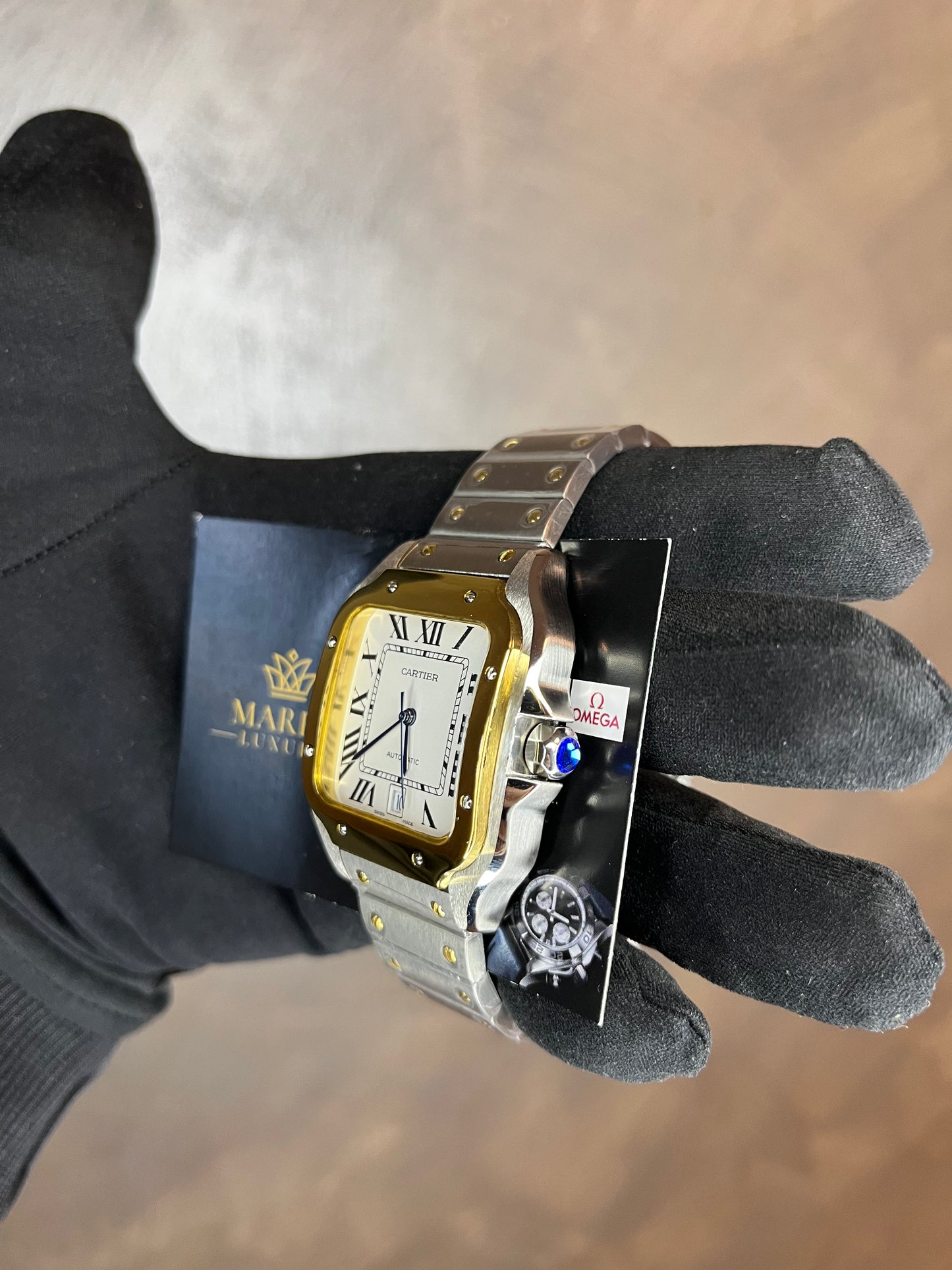 CARTIER SANTOS 40 MM DATA ACCIAIO CON GHIERA ORO GIALLO