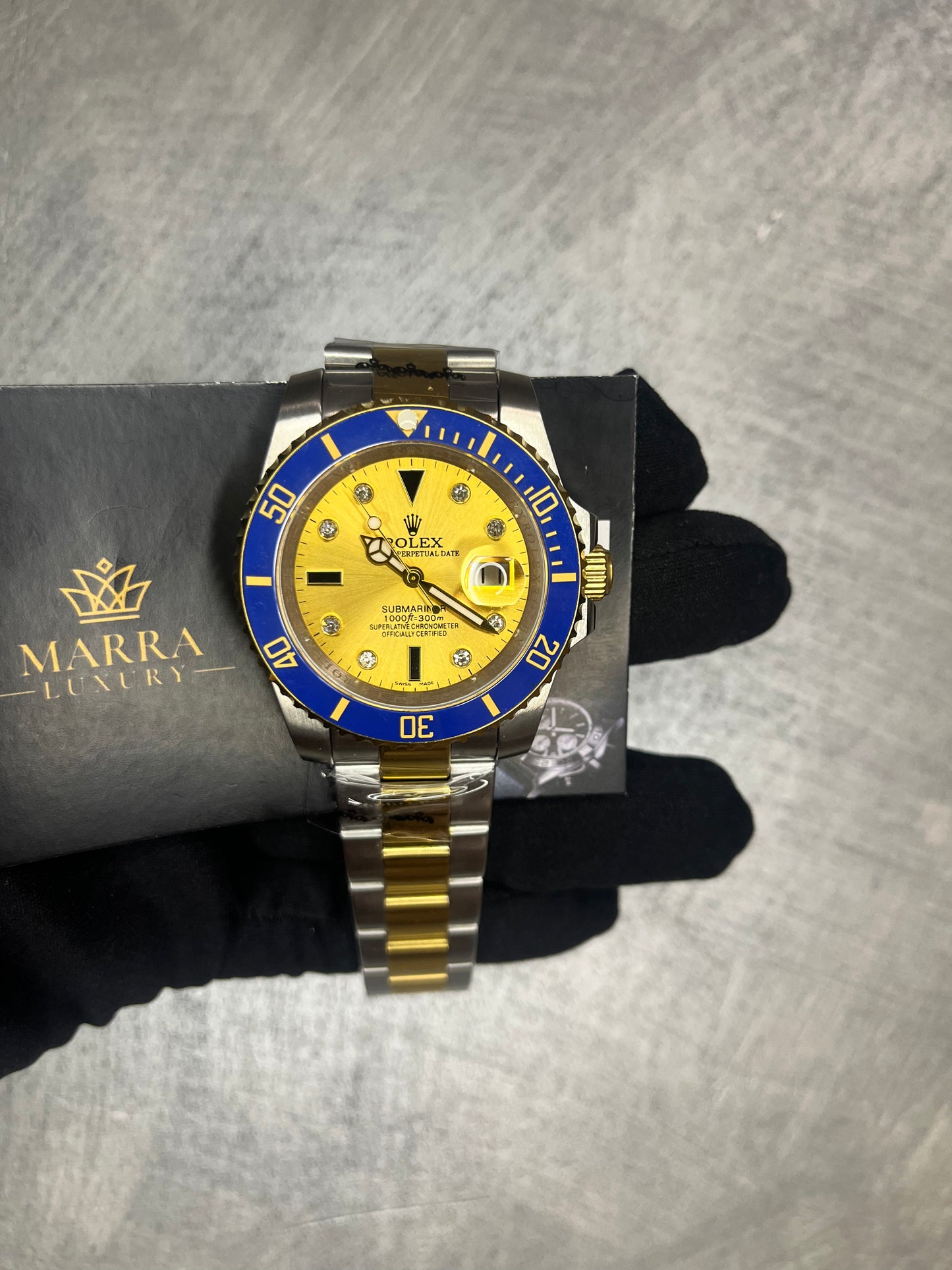 ROLEX SUBMARINER ORO E ACCIAIO QUADRANTE CHAMPAGNE CON BRILLANTI