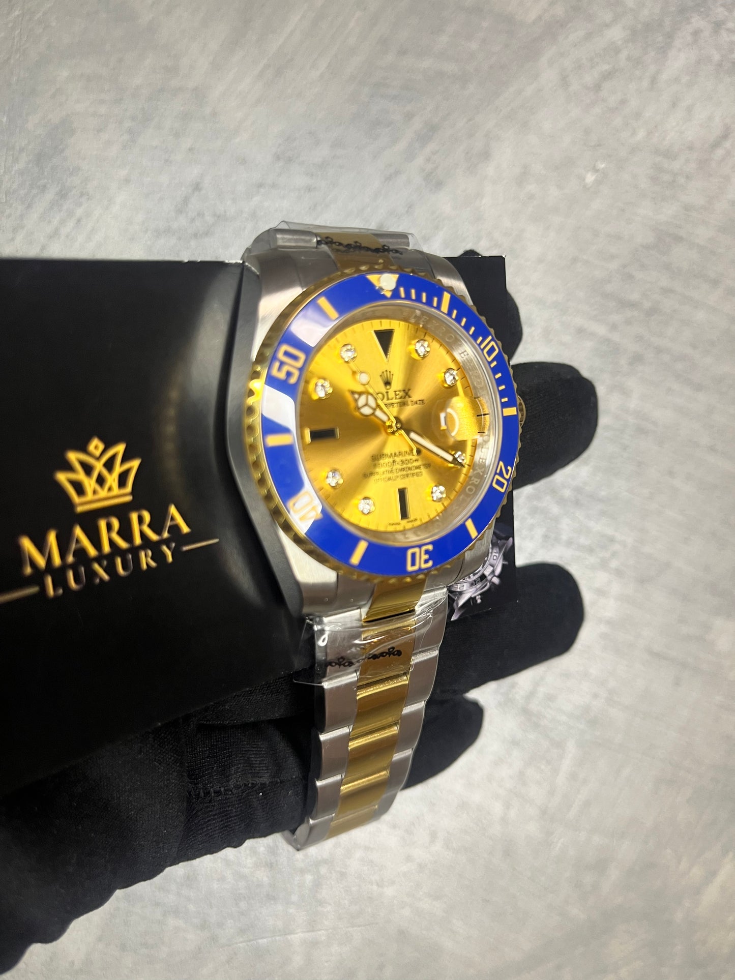 ROLEX SUBMARINER ORO E ACCIAIO QUADRANTE CHAMPAGNE CON BRILLANTI