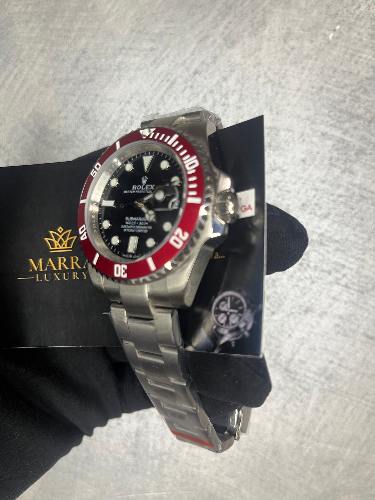 ROLEX SUBMARINER GHIERA ROSSA CON QUADRANTE NERO