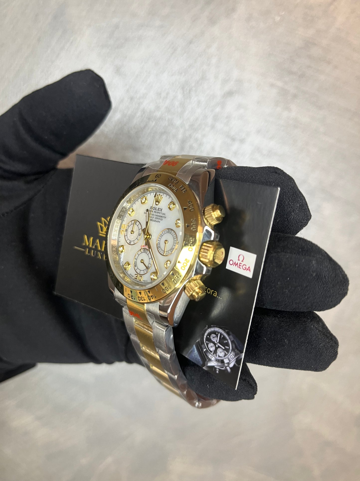 ROLEX DAYTONA ORO E ACCIAIO, QUADRANTE MADREPERLA CON BRILLANTINI