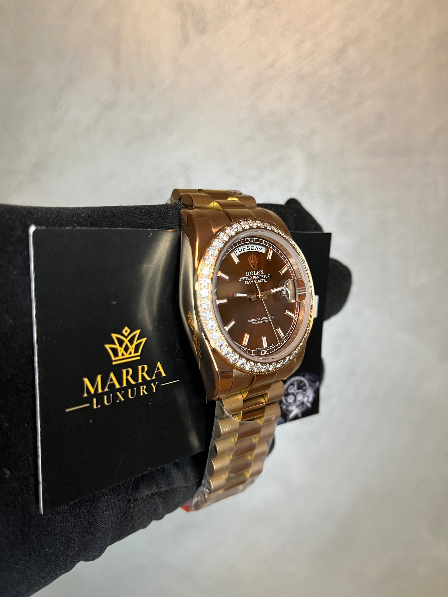 ROLEX DAYDATE PRESIDENT ORO ROSA QUADRANTE CHOCOLAT GHIERA CON BRILLANTINI