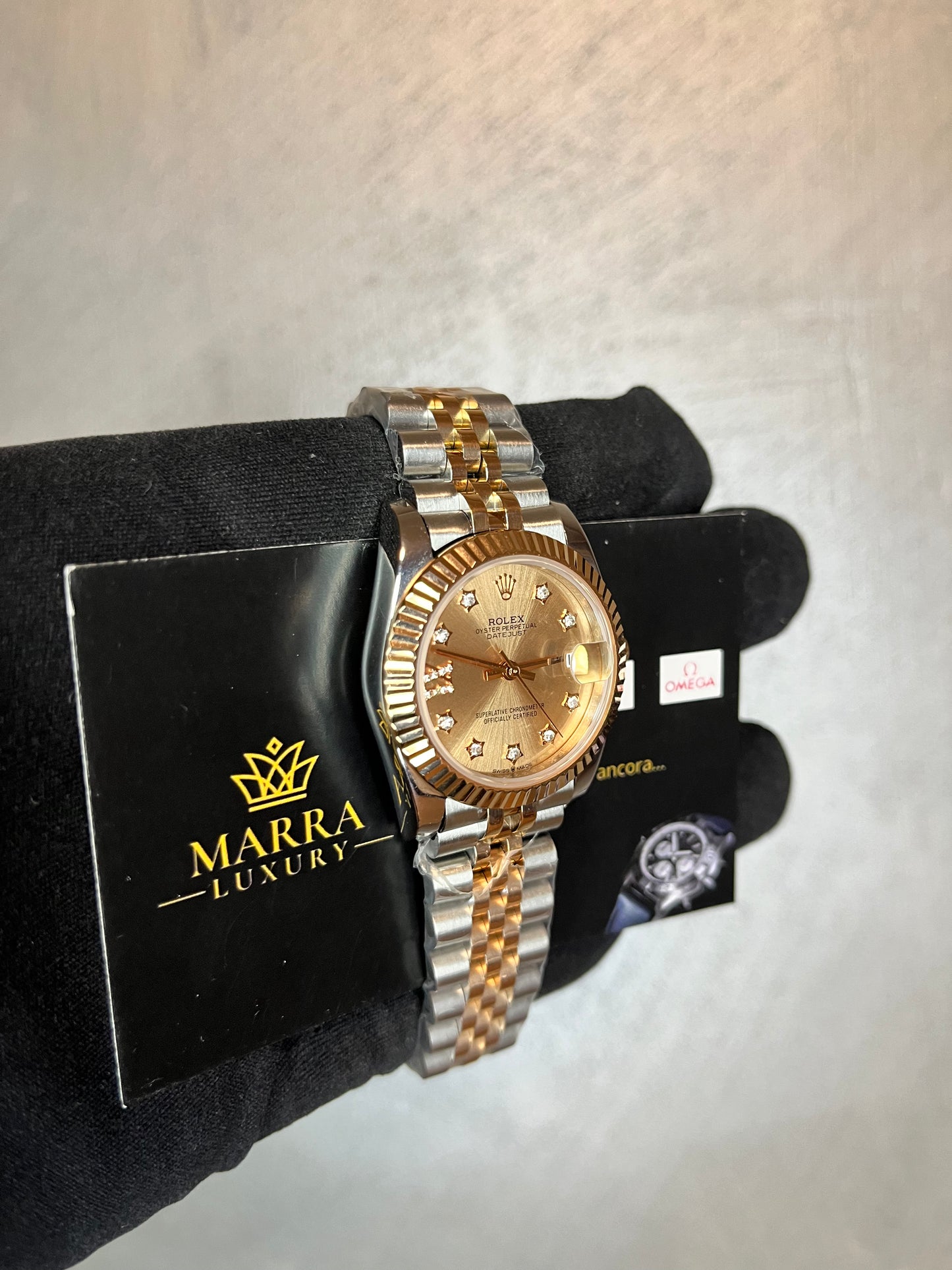 ROLEX DATEJUST LADY 31 MM ORO E ACCIAO QUADRANTE SALMONE, DETTAGLI STELLE BRILLANTINI